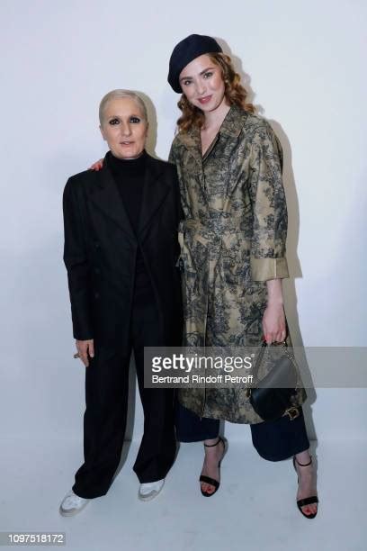 Stylist Maria Grazia Chiuri and Freya Mavor pose after the 